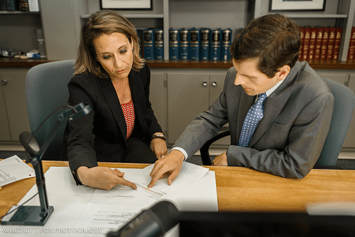 maine personal injury attorneys | ali and chris discussing a case